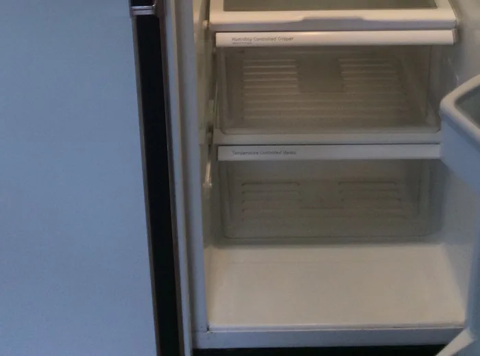 The same refrigerator compartment cleaned out